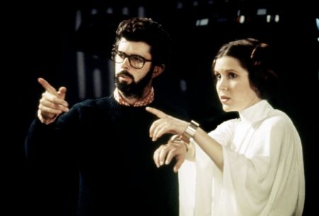 George Lucas with Carrie Fisher during Star Wars: Episode IV – A New Hope.